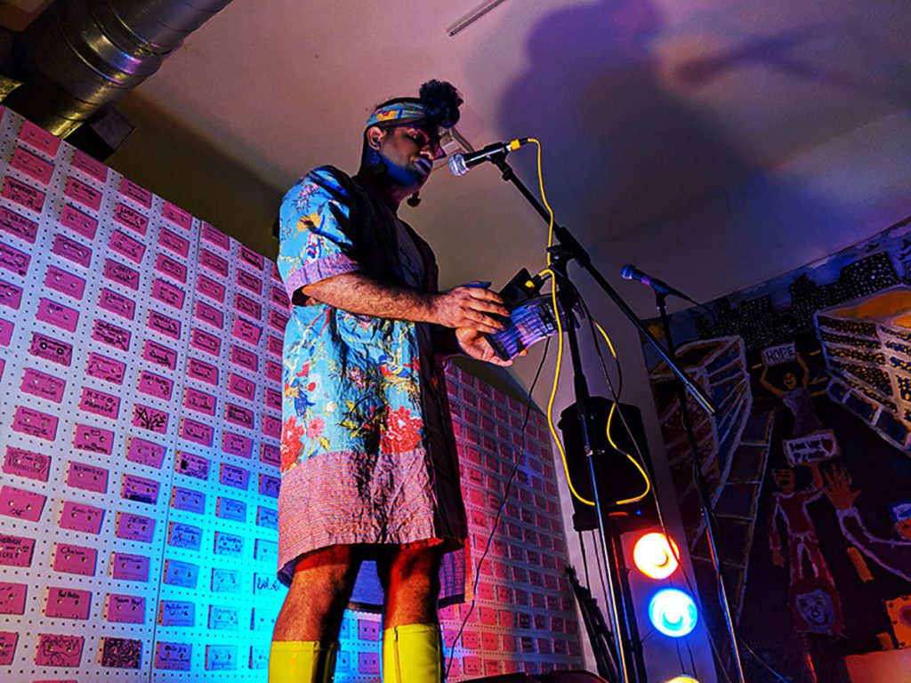 Alok (Alok Vaid-Menon) on stage